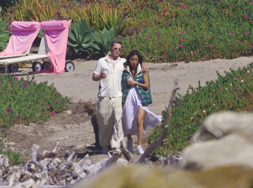 Brad Pitt and Ines De Ramon on a beach stroll