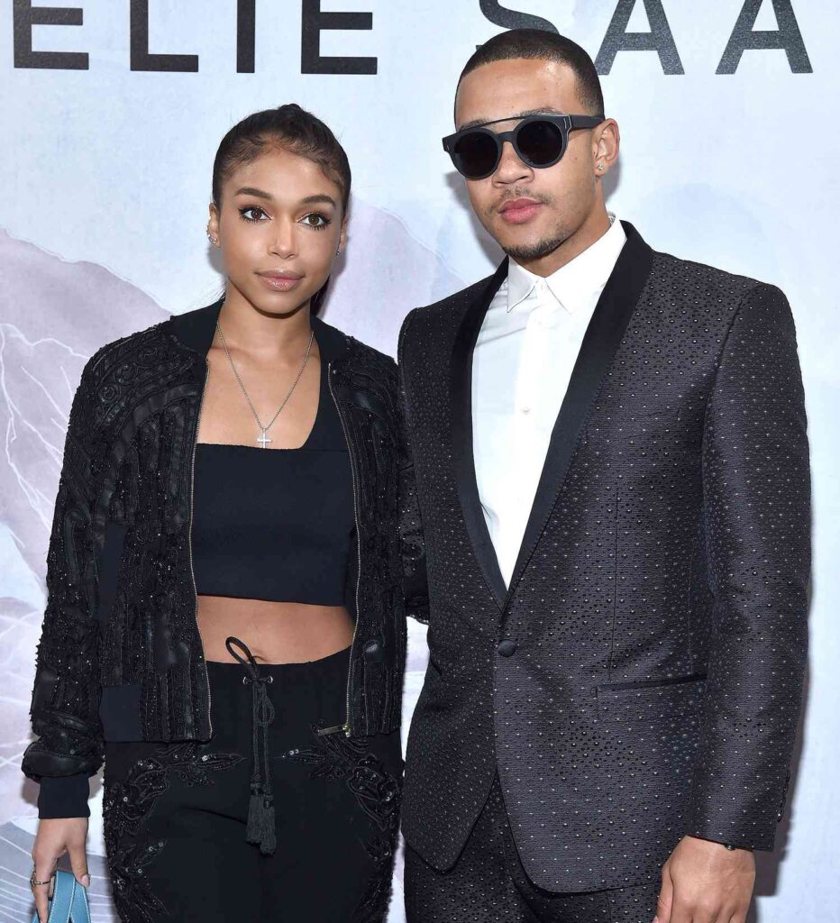 Lori Harvey and Memphis Depay attend the Elie Saab fashion show