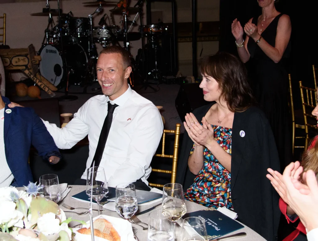 Chris Martin and Dakota Johnson Place for Peace event