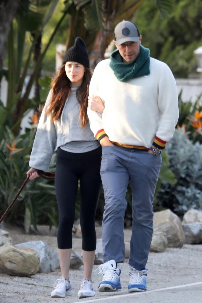 Dakota Johnson with Chris Martin