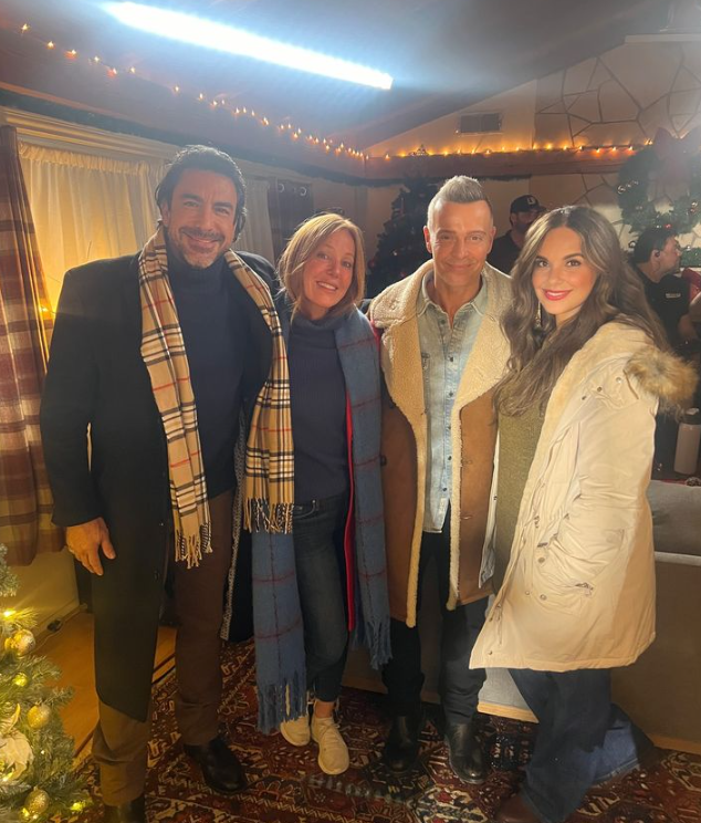 Melina Alves and Joey Lawrence with the cast of their film - Socked In For Christmas