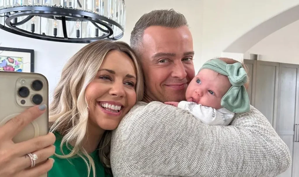 Samantha Cope and Joey Lawrence with their newborn daughter