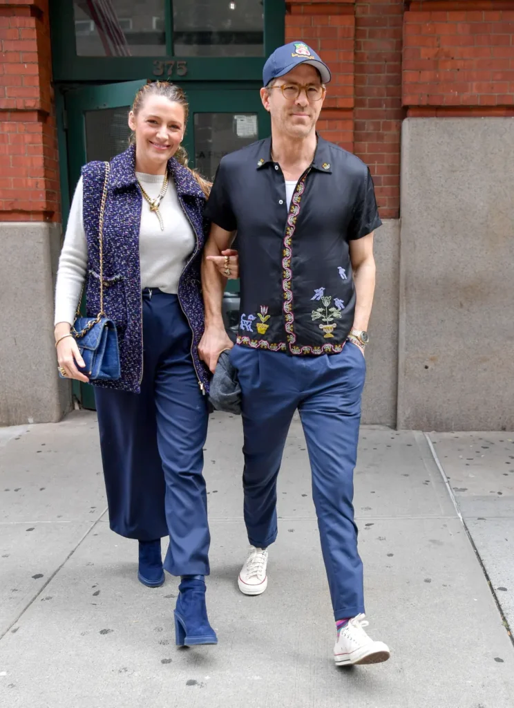 Blake Lively and Ryan Reynolds holding hands as they step out in New York City