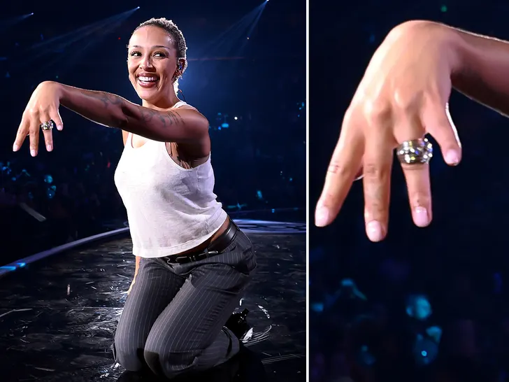 Doja Cat flaunting her ring while performing at the iHeartRadio Music Festival