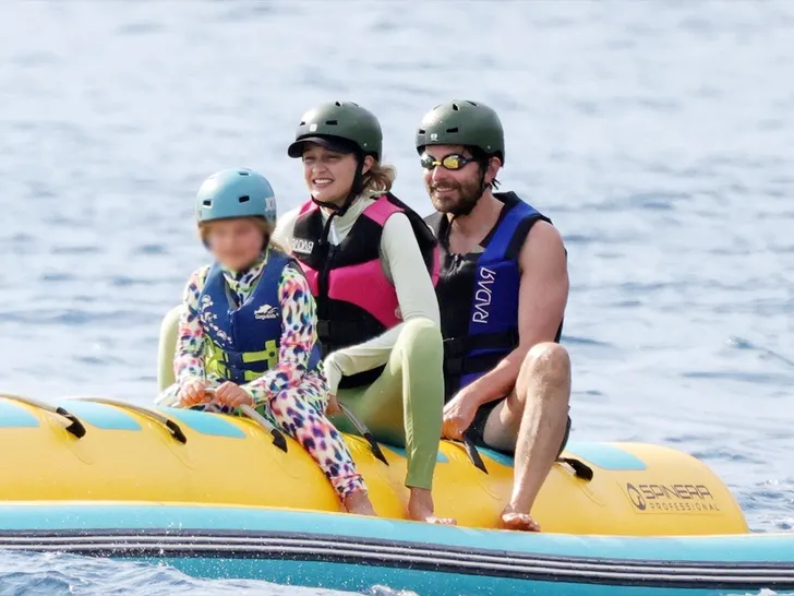 Gigi Hadid, Bradley Cooper, and Lea De Seine enjoying a banana boat ride