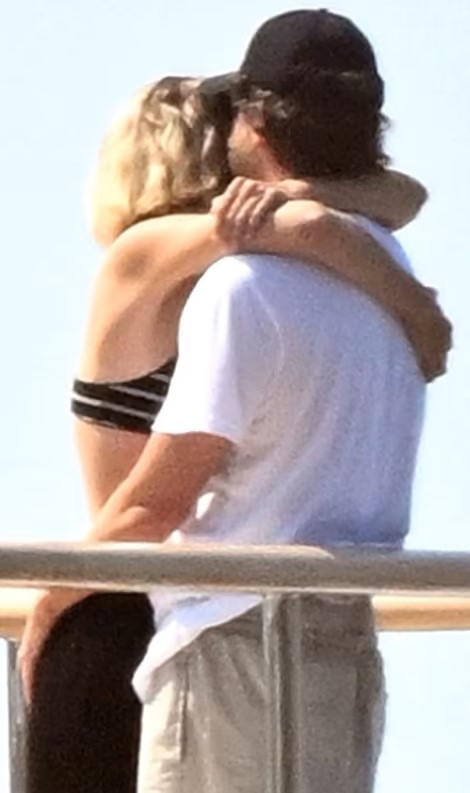 Gigi Hadid and Bradley Cooper share a hug and a kiss on their Italian getaway