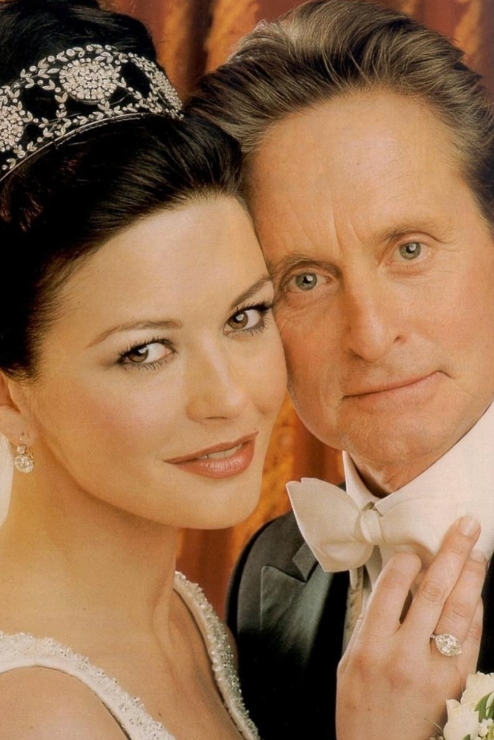 Catherine Zeta-Jones and Michael Douglas posing for their wedding album