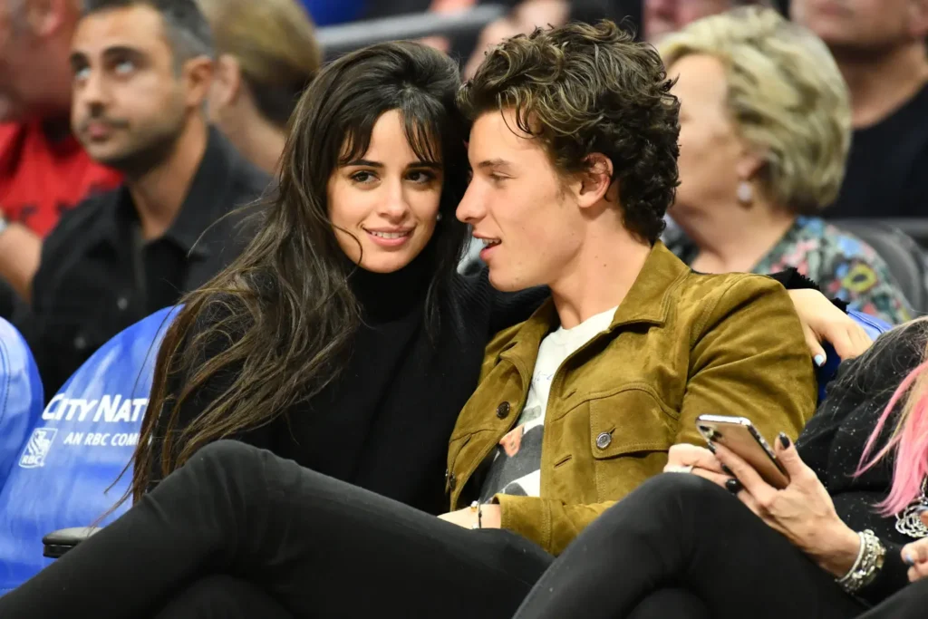 Shawn Mendes and Camila Cabello at a basketball game