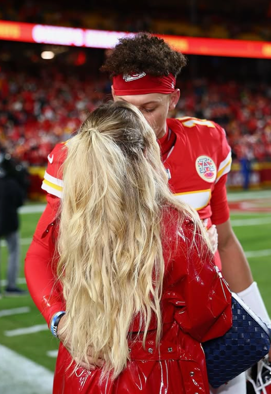 Patrick and Brittany Mahomes share a passionate kiss