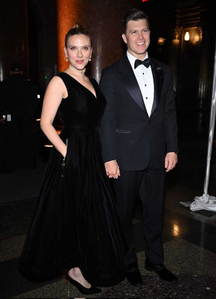 Scarlett Johansson and Colin Jost posing together on the red carpet of the 2024 Museum Gala