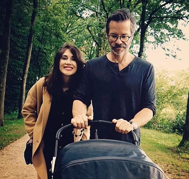 Carice Van Houten and Guy Pearce on a stroll with their son