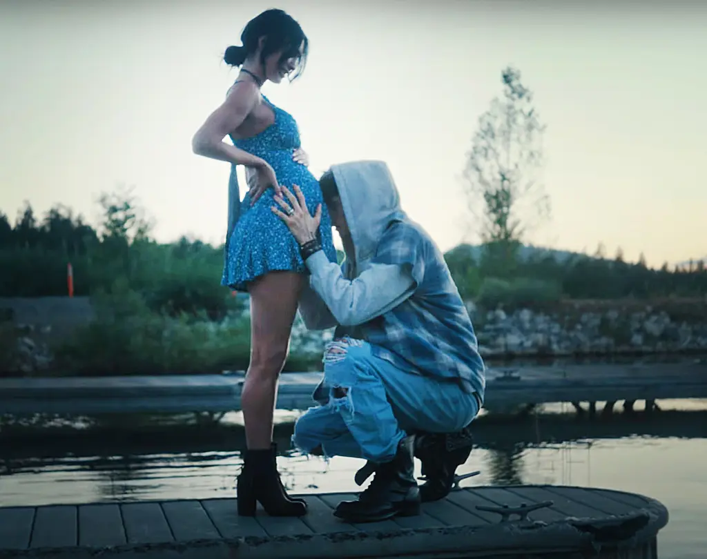 Megan Fox Fumes Over Ex MGK’s “Flirting With Other Women” Amid Rocky Coparenting Dynamic 2 MGK kisses Megan Fox's baby bump in a music video